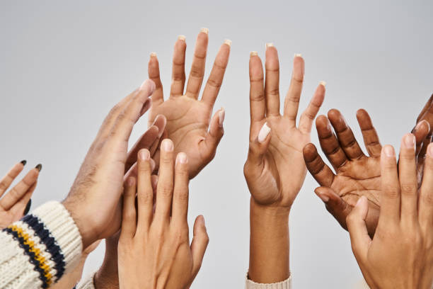 istock Celebrating friendship and diversity with joyful hands in a creative studio 2170327559