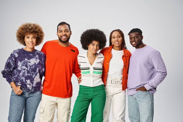 istock A vibrant group of diverse friends smiling together in a bright studio setting 2170327645
