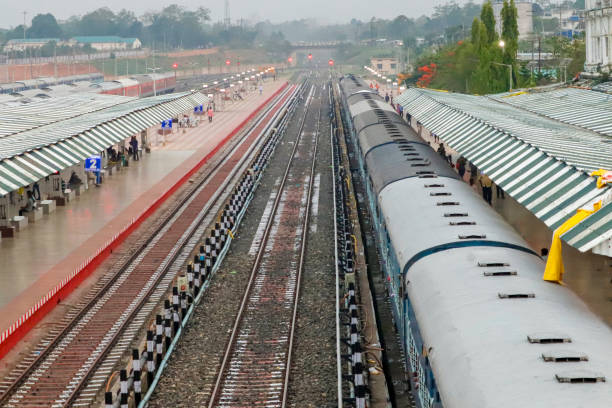istock Busy railway station with multiple tracks, platforms, and stationary trains 2170330467