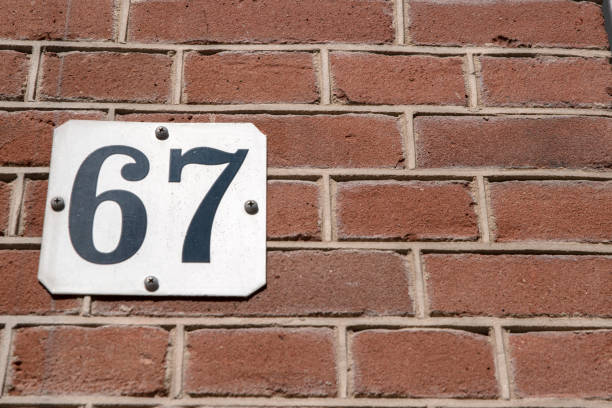 istock Close Up House Number 67 2170332180