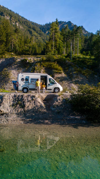 istock Exploring the serene beauty of Plansee Austria with a camper van by the tranquil waterside 2170334203