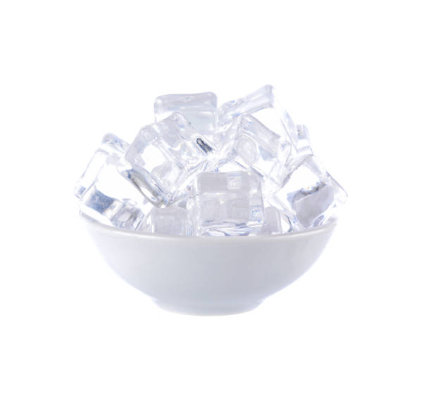 istock ice cubes in bowl on white background 2170341450