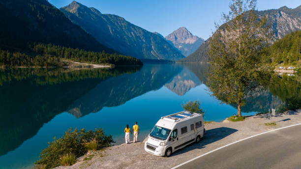 istock Exploring the tranquil shores of Plansee, Austria, with mountains reflecting on the serene waters 2170342199
