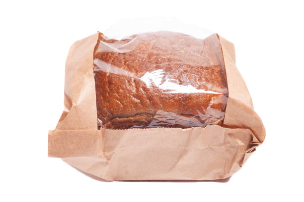 istock Rye bread in a paper bag isolated on white background. 2170343082