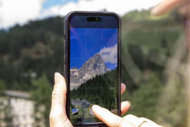 istock Tourist photographing Matterhorn 2170343866