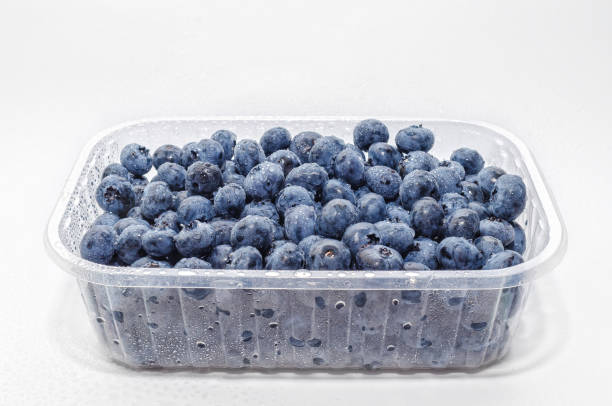 istock Transparent box with fresh blueberries isolated on white. Side view. Antioxidants, vitamins, health. 2170344038