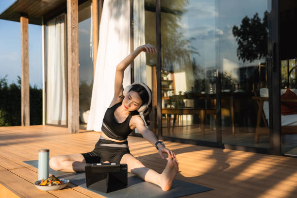 istock Asian woman doing mindful meditation at home 2170346315