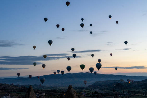 istock Hot air balloons rise before the sun rises 2170347849