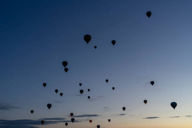 istock Hot air balloons rise before the sun rises 2170348064