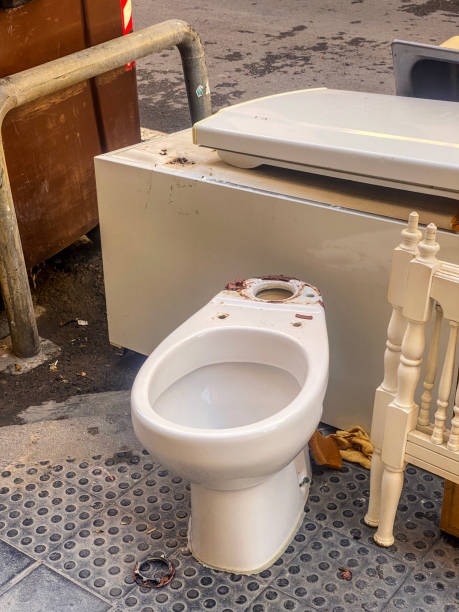 istock Broken toilet bowl left in the street 2170349426