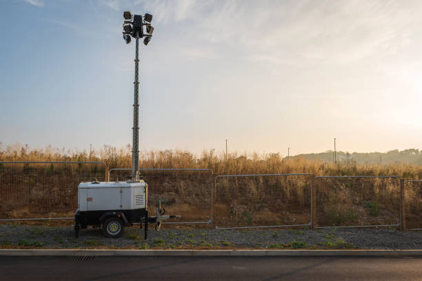Mobile construction lights next to new housing development in england uk