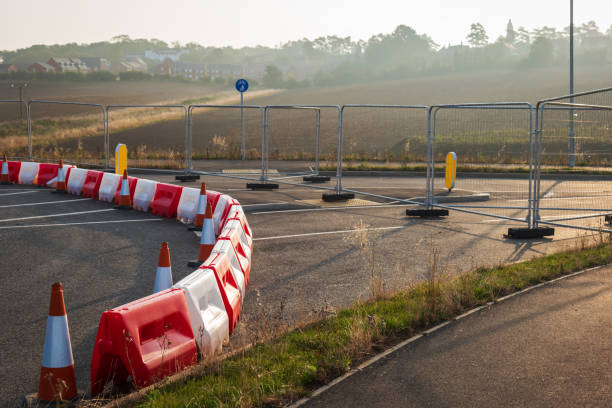 istock Fence around new build housing development estate in england uk 2170351086