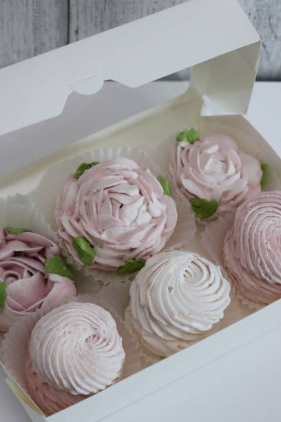 istock Homemade marshmallows in an open box. Marshmallow flowers. Close up. 2170353818