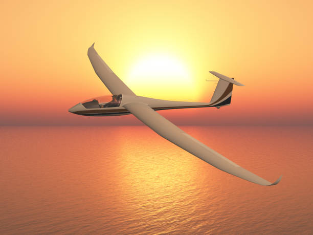 istock Glider over the sea at sunset 2170354023
