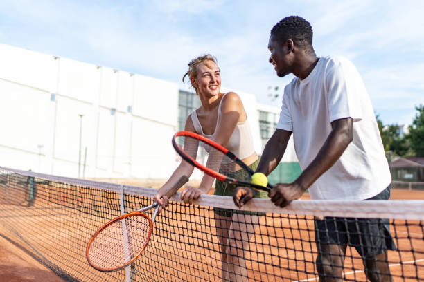 istock A couple relaxing, playing tennis 2170355181