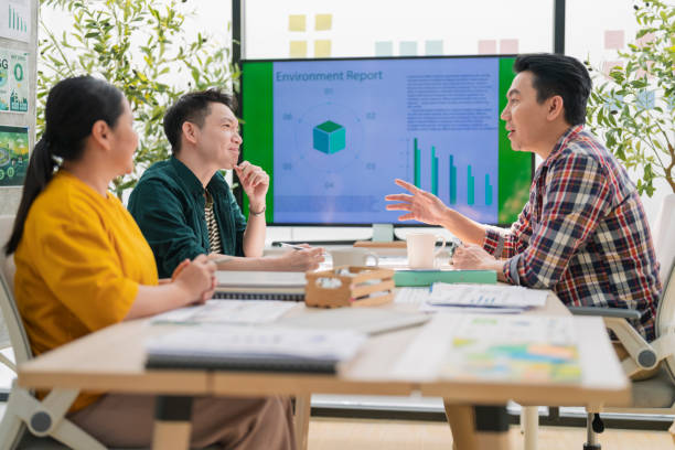 istock Ideas sharing for Business success. Business Development Teamwork start new project status meeting or decision to report  ESG (environment,social,governance) for sdgs goals in a sustainable green office working discussion 2170356316