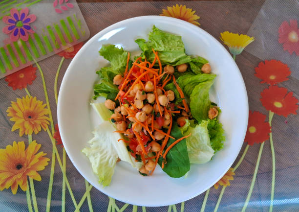 : Lettuce, Arugula, Carrot, Chickpea, Tomato and Fresh Herb Salad