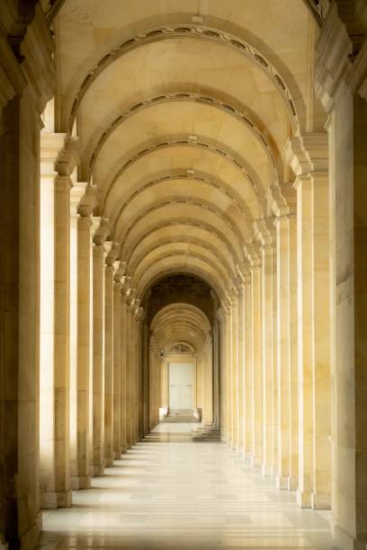istock Elegant corridor with arches and columns in a historic building. 2170358778