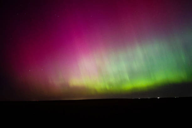 Northern lights- Aurora Borealis Northern lights, Aurora Borealis, Colorado. Colorful sky aurora borealis orange stock pictures, royalty-free photos & images