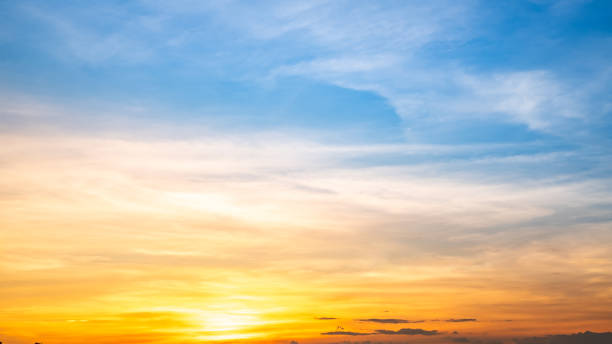 istock Beautiful , luxury soft gradient orange gold clouds and sunlight on the blue sky perfect for the background, take in everning,Twilight, Large size, high definition landscape photo 2170364312