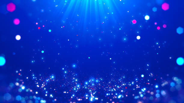 istock A dazzling blue background with sparkling lights and bokeh effects, featuring a radiant light source from above. 2170366234