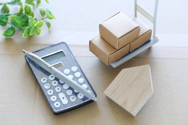 istock Image of moving estimate using house models and cardboard miniatures 2170368335