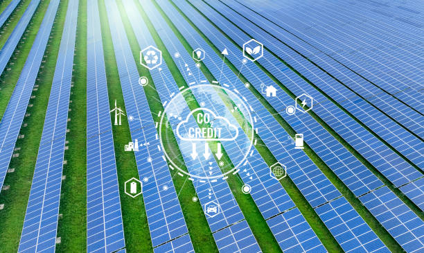 istock Carbon credit concept featuring a solar farm in background. Green energy solutions through sustainable renewable energy sources, including wind and solar farms for carbon credits in industrial sector. 2170371341