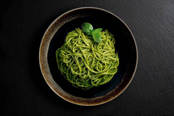 istock Dark bowl with linguine with Genoese pesto sauce 2170371996