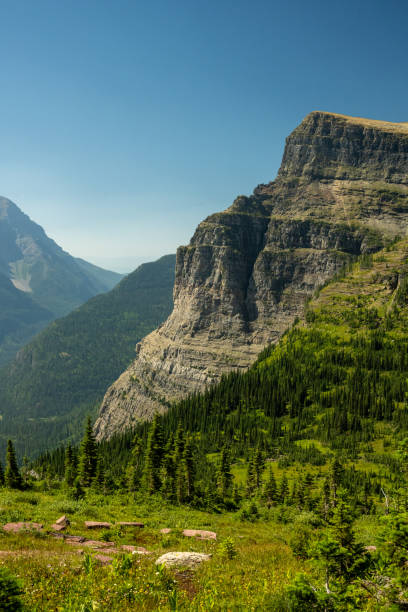 istock Exposed Wall Of Boulder Pass Rises Over The Thick Forest Below 2170372151