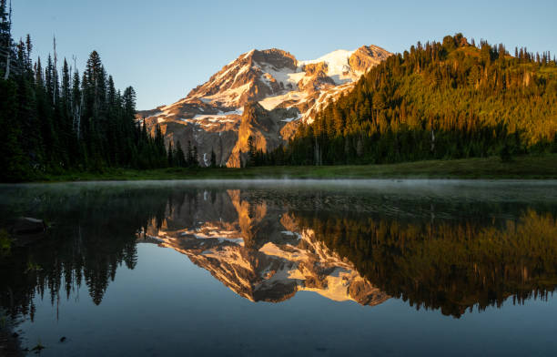 istock Flat Waters of Klapatche Pond Reflect Mount Rainier 2170372203