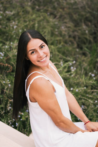 istock girl walking in the garden 2170373335