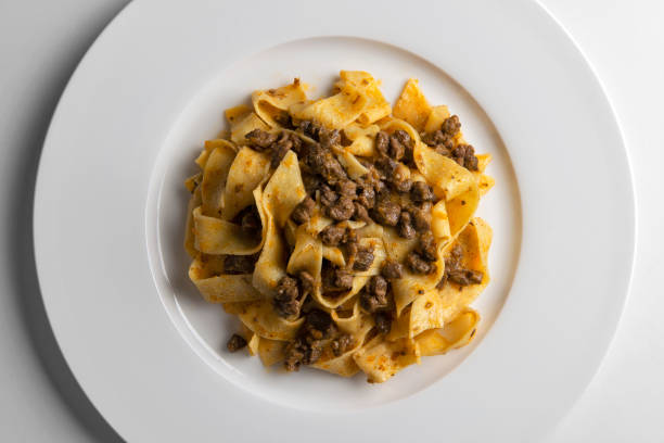 istock Plate with pappardelle with wild boar ragout sauce 2170376020