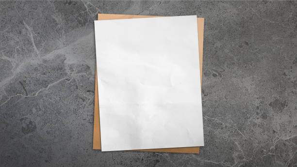 istock white and brown grunge paper placed on dark grey marble background. paper with blank space for add text or art works. 2170377472