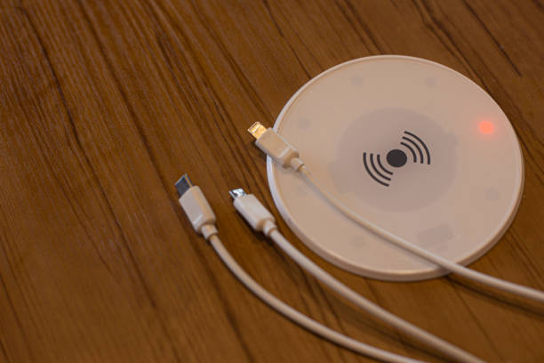 istock Mobile smartphone is placed on a wireless fast charger. 2170378795