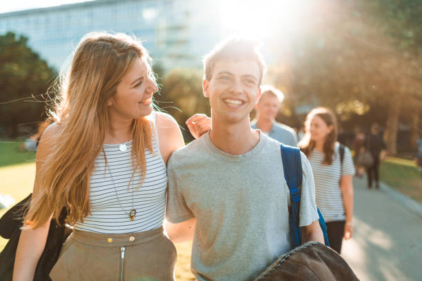istock happiness student walking togetherness in london at dusk 2170379143