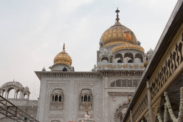 Silhouette of Sikh prayer at golden temple, Amritsar, India