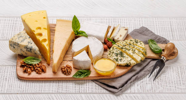 istock An assortment of various cheeses arranged on a board, highlighting different textures 2170384806