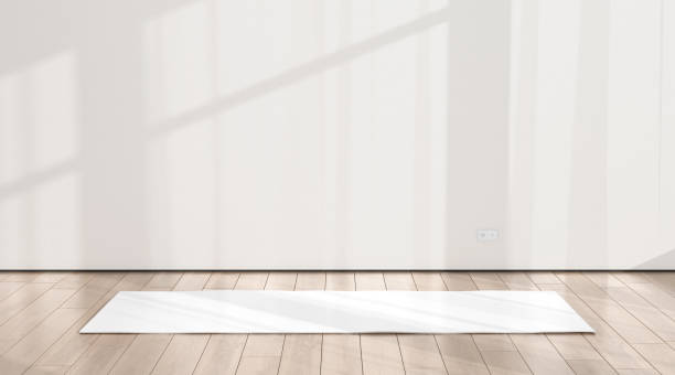 istock Blank white yoga mat in sport area with shadow mockup 2170391238