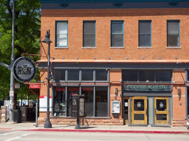 Moab, Utah - USA, April 30, 2024. Cooper Martin building now a restaurant along main street in downtown Moab. Moab once a small town with uranium ore deposits nearby became a boom town for mining. Now a tourist mecca for outdoor adventure.