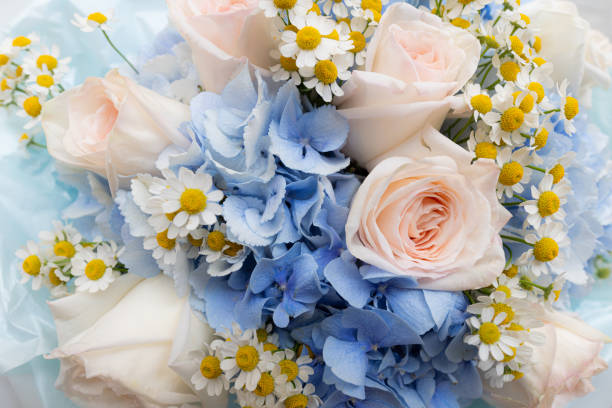 istock closeup of rose, hydrangea and daisy  bouquet 2170392756