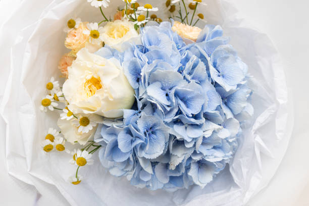 istock closeup of rose, hydrangea and daisy  bouquet 2170392765
