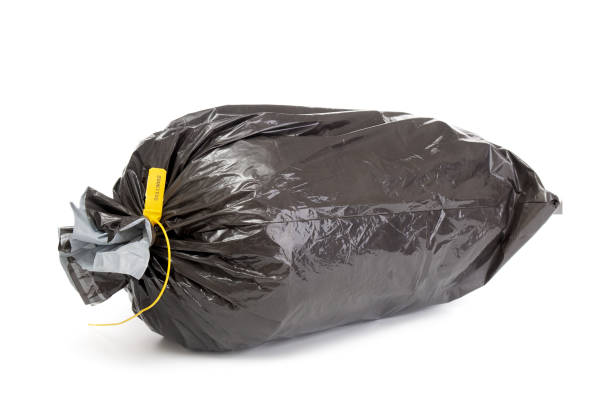 istock Black plastic sack close up on a white background 2170393269