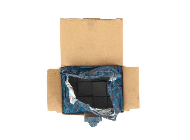 istock Charcoal cubes for hookah in packaging  isolated on white background 2170393539