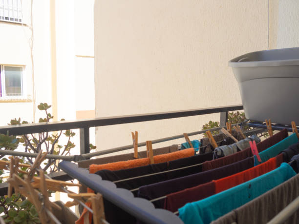 hanging clothes on the balcony