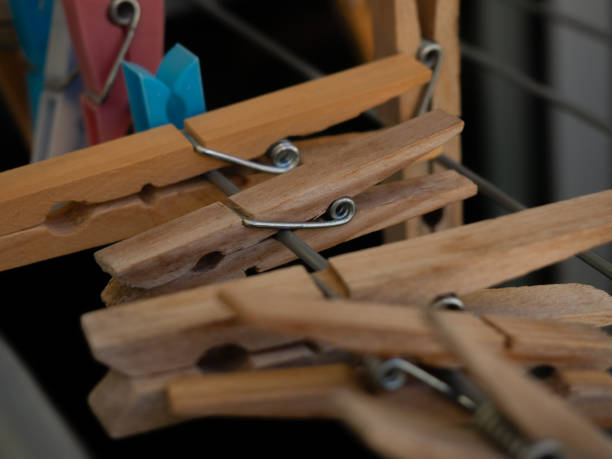 istock wooden clothes pegs on the clothesline 2170395314
