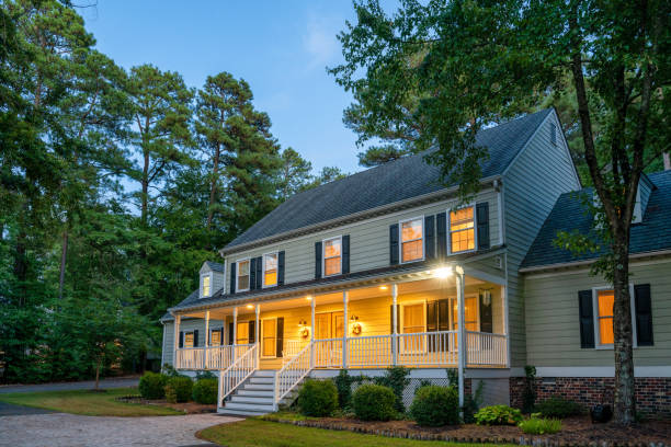 istock Colonial style house at dusk 2170396779