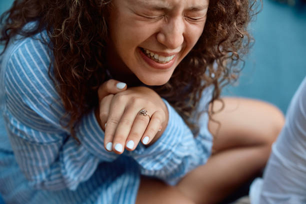 Young woman feeling emotional after getting engaged.