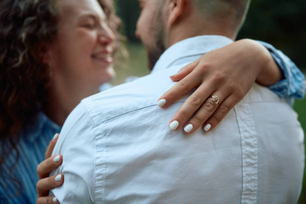 istock Close up of engaged couple embracing. 2170397548