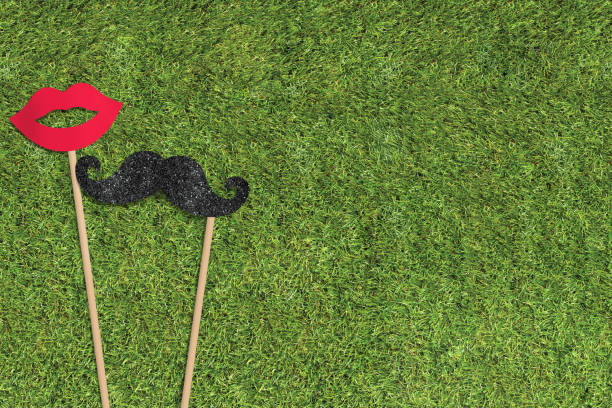 Photo booth colourful props for party on a green grass