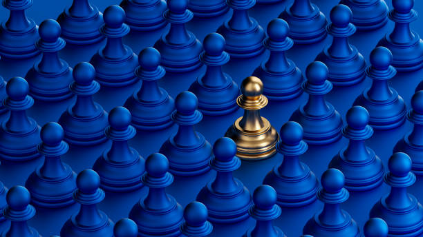 istock Chess pieces, golden pawn surrounded by blue pawns, standing out, uniqueness, leadership, strategic concept, individuality, shiny metallic texture, minimalist design, blue background, symmetrical rows, contrast, 3D render. 2170399281